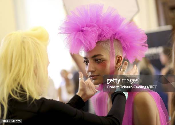 Model backstage ahead of the Pam Hogg Show during London Fashion Week September 2018 at the Freemasons Hall on September 14, 2018 in London, England.