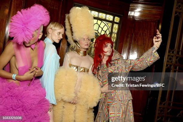 Models backstage ahead of the Pam Hogg Show during London Fashion Week September 2018 at the Freemasons Hall on September 14, 2018 in London, England.