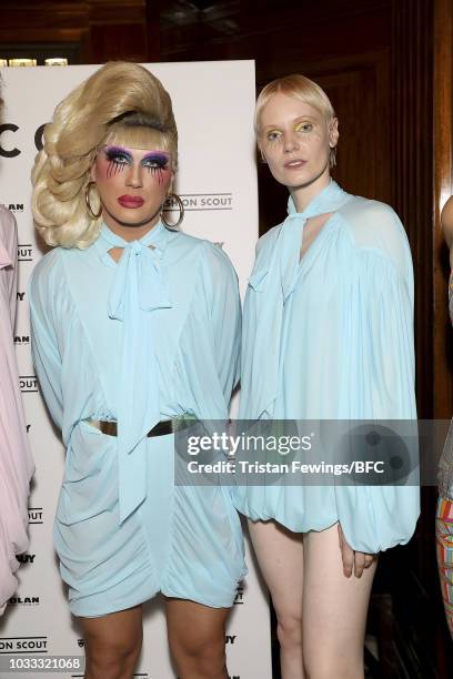 Jodie Harsh and a model backstage ahead of the Pam Hogg Show during London Fashion Week September 2018 at Freemasons Hall on September 14, 2018 in...