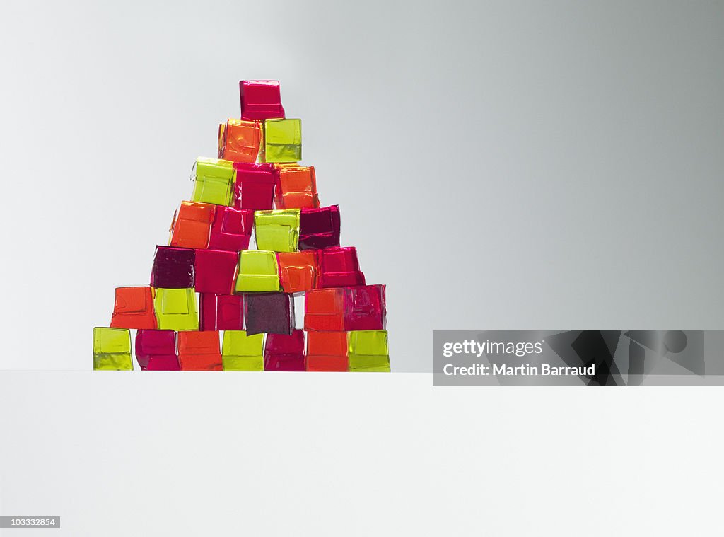 Pyramid of vibrant gelatin dessert cubes