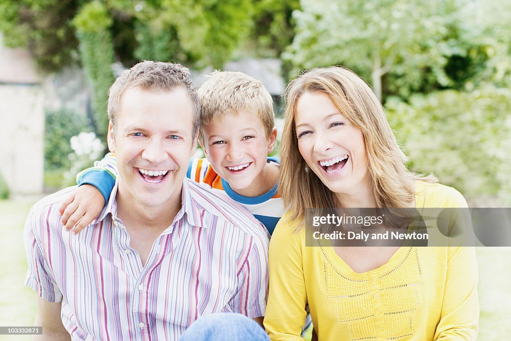 Laughing family in backyard