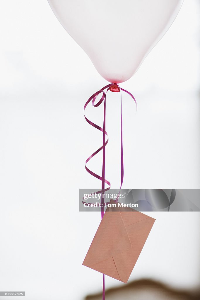 Balloon With Card Attached To String High-Res Stock Photo - Getty Images