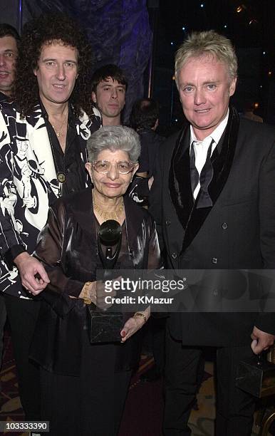 Queen's Brian May and Roger Taylor with Jer Bulsara, Freddie Mercury's mother, and presenter Dave Grohl