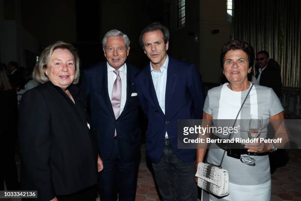 Maryvonne Pinault, Chairman of the Board of Galeries Lafayette Group, Philippe Houze, his wife Christiane Houze and their son Director of Image,...