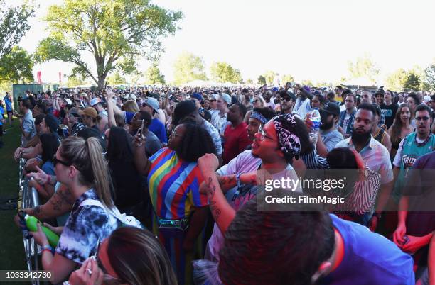 Festivalgoers attend a performance by Big K.R.I.T. On the Paper Stage during day 1 of Grandoozy on September 14, 2018 in Denver, Colorado.