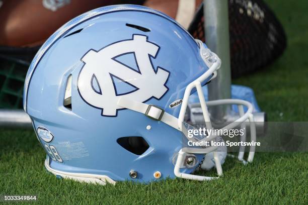 North Carolina Tar Heels helmet sits on the side lines during a game between the East Carolina Pirates and the North Carolina Tar Heels at...