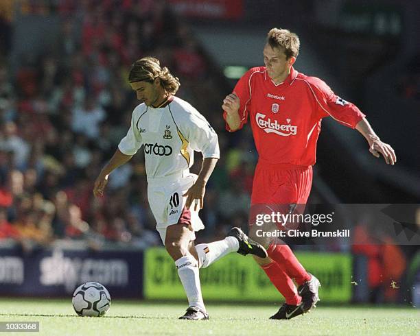 Benito Carbone of Bradford holds off Dietmar Hamman of Liverpool during the Liverpool v Bradford City match in the FA Premiership at Anfield,...