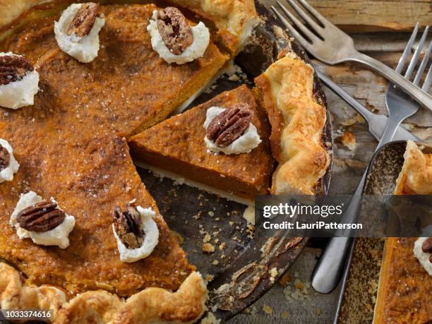 pumpkin pie with candied pecans and whip cream - tart dessert stock pictures, royalty-free photos & images