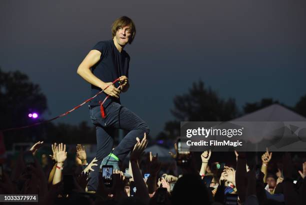 Thomas Mars of Phoenix performs in the crowd at the Scissor Stage during day 1 of Grandoozy on September 14, 2018 in Denver, Colorado.