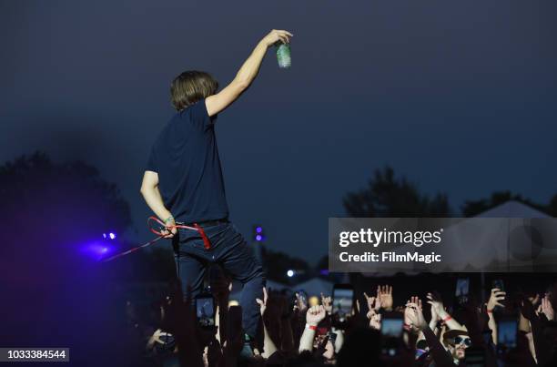 Thomas Mars of Phoenix performs in the crowd at the Scissor Stage during day 1 of Grandoozy on September 14, 2018 in Denver, Colorado.