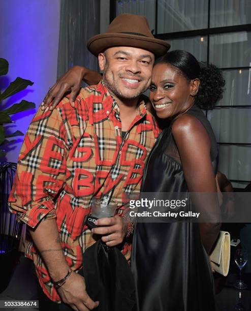 Anthony Hemingway and Adina Porter attend the Audi pre-Emmy celebration at the La Peer Hotel in West Hollywood on Friday, September 14, 2018.