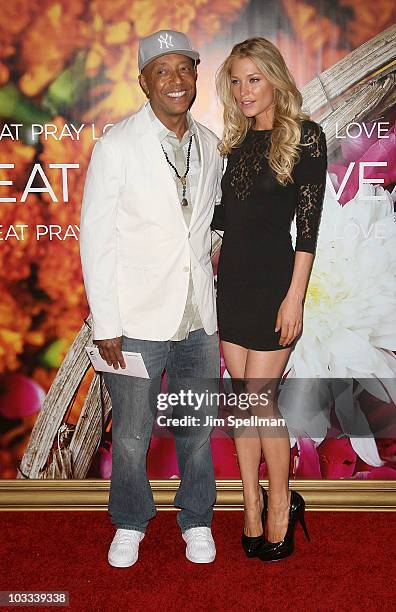 Russell Simmons and Cynthia Kirchner attend the premiere of "Eat Pray Love" at the Ziegfeld Theatre on August 10, 2010 in New York City.