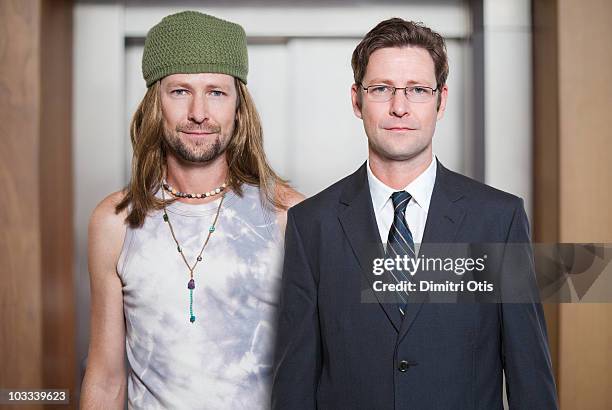 same man dressed as hippy and businessman - same person different outfits stock-fotos und bilder