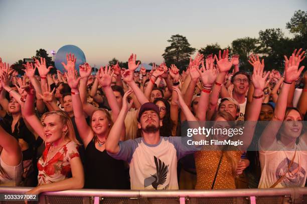 Festivalgoers attend a performance by Phoenix on the Scissor Stage during day 1 of Grandoozy on September 14, 2018 in Denver, Colorado.