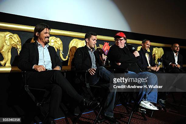 Actor Josh Brolin, former soldier Russell Baer, filmmaker Michael Moore, producer John Battsek and director Amir Bar-Lev participate in a discussion...