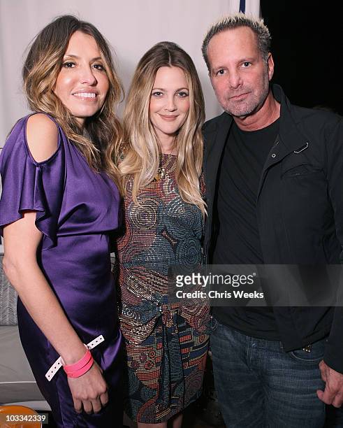 Jaclynn Jarrett, actress Drew Barrymore and Marvin Scott Jarrett attend a party for the Barrymore's NYLON cover at The London Hotel on August 10,...
