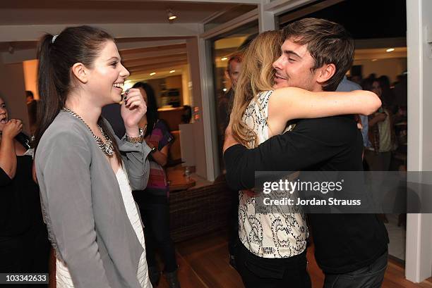 Actors Michelle Trachtenberg, Leslie Mann and Zac Efron attend an event celebrating the September issue of Details magazine at a private residence on...