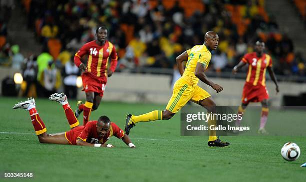 Tshepo Masilela and draman Haminuduring the International Friendly match between South Africa and Ghana at Soccer City Stadium on August 11, 2010 in...