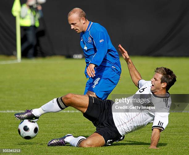 Dennis Diekmeier of Germany challenges Kristinn Jonsson of Iceland during the UEFA U21 championship match betweeen Iceland and Germany on August 11,...