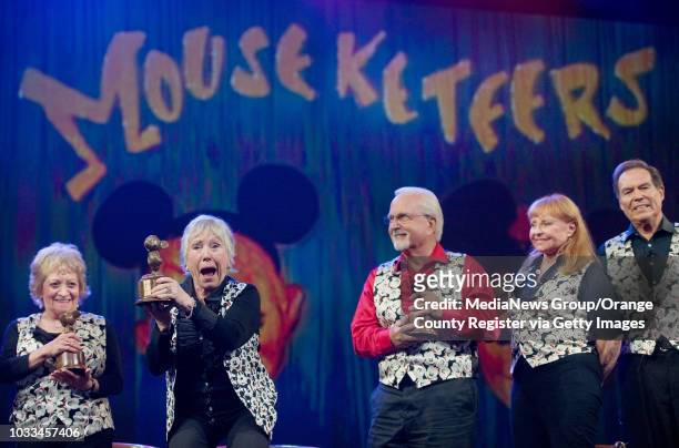 Darlene Gillespie shows off a "Mousecar" trophy given to her and the other original Mouseketters from the 1950s "Mickey Mouse Club" TV show....