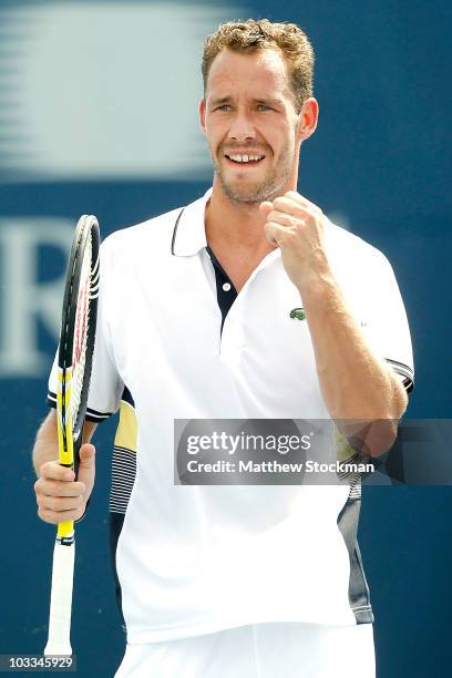 Michael Llodra of Frace celebrates match point against Nicolas Almagro of Spain during the Rogers Cup at the Rexall Centre on August 11, 2010 in...