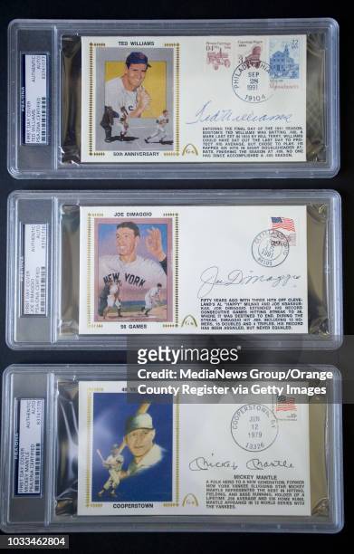 Ian Taylor's autographed rare collectors First Day Covers include Ted Williams, top, Joe DiMaggio and Mickey Mantle. ///ADDITIONAL INFO: - Photo by...