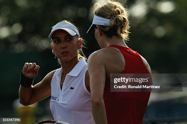 Elena Vesnina of Russia and Meghann Shaughnessy between points against Akgul Amanmuradova of Uzbekistan and Vera Dushevina of Russia during day three...