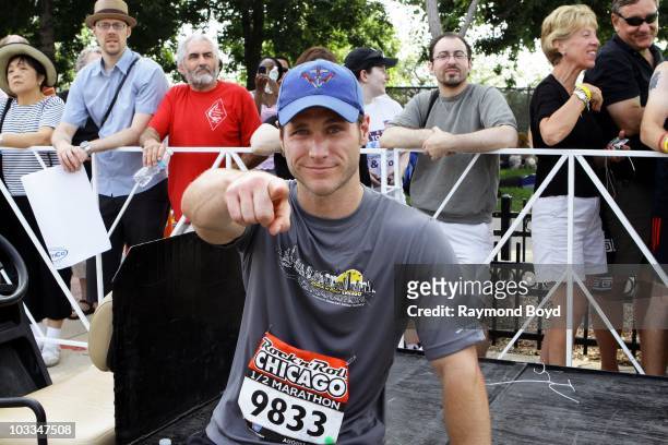 Jake Pavelka from "The Bachelor" poses for photos after running in the 2nd Annual Rock N Roll Chicago 1/2 Marathon on Columbus Drive in Chicago,...