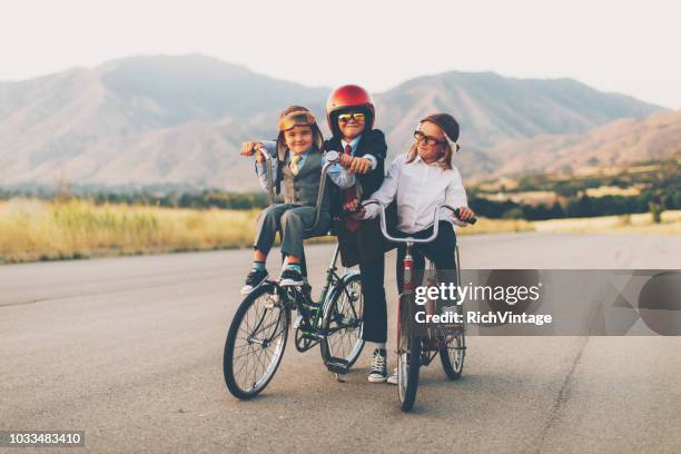 young business biking team - adult imitation stock pictures, royalty-free photos & images