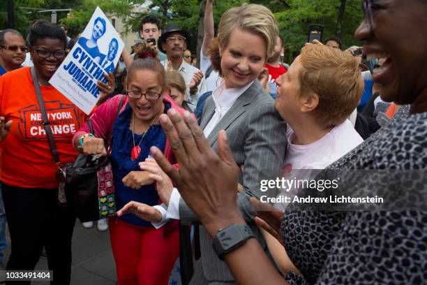 Cynthia Nixon and Zephyr Teachout dance with supporters at a get out the vote rally on September 8, 2018 in the Williamsburg neighborhood of Brooklyn...