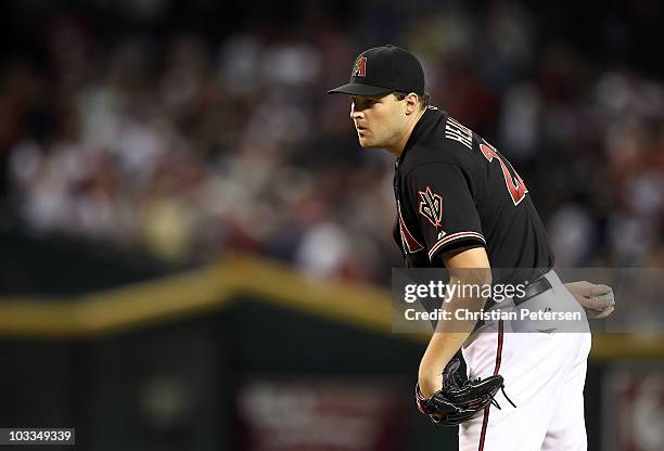 Relief pitcher Aaron Heilman of the Arizona Diamondbacks pitches against the San Diego Padres during the Major League Baseball game at Chase Field on...