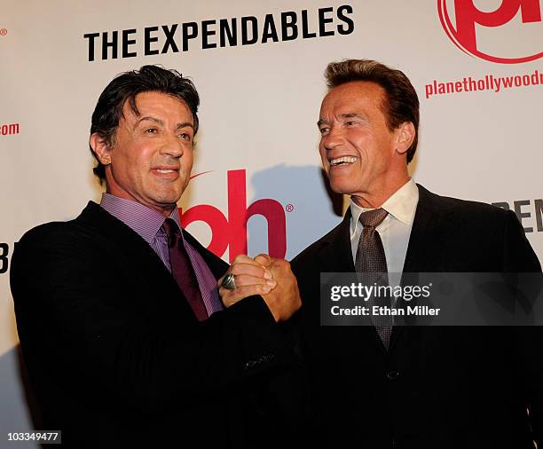 Actor Sylvester Stallone and California Gov. Arnold Schwarzenegger arrive at a screening of Lionsgate Films' "The Expendables" at the Planet...