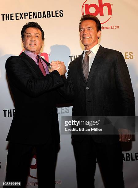 Actor Sylvester Stallone and California Gov. Arnold Schwarzenegger arrive at a screening of Lionsgate Films' "The Expendables" at the Planet...