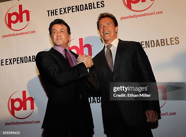 Actor Sylvester Stallone and California Gov. Arnold Schwarzenegger arrive at a screening of Lionsgate Films' "The Expendables" at the Planet...