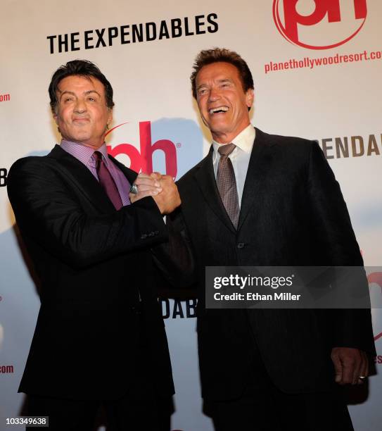 Actor Sylvester Stallone and California Gov. Arnold Schwarzenegger arrive at a screening of Lionsgate Films' "The Expendables" at the Planet...