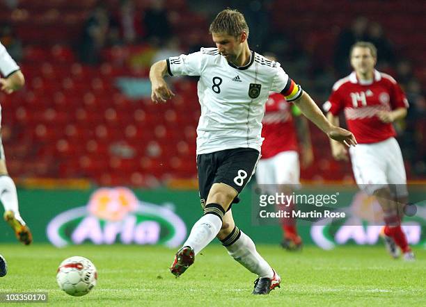 Thomas Hitzlsperger of Germany runs with the ball during the International Friendly match between Denmark and Germany at Parken stadium on August 11,...