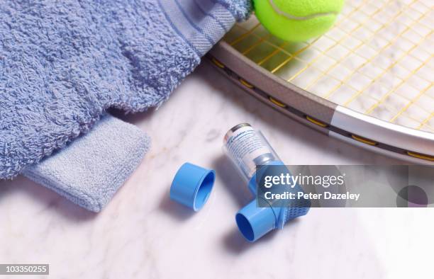 asthma inhaler in gymnasium - reliever asthma inhaler stock pictures, royalty-free photos & images