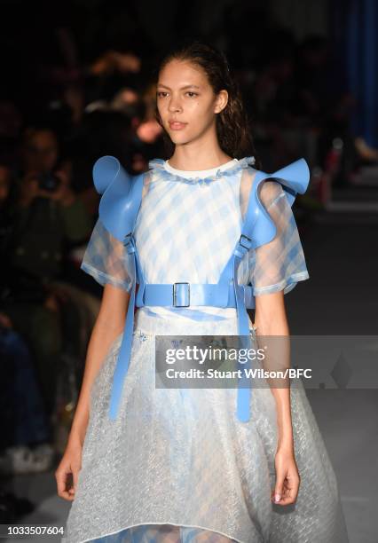 Models walk the runway at the Xiao Li Show during London Fashion Week September 2018 at The BFC Show Space on September 14, 2018 in London, England.