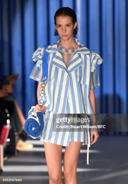 Models walk the runway at the Xiao Li Show during London Fashion Week September 2018 at The BFC Show Space on September 14, 2018 in London, England.