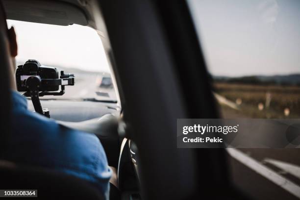 behind scene improvisation - cameraman filming  from car - following car stock pictures, royalty-free photos & images