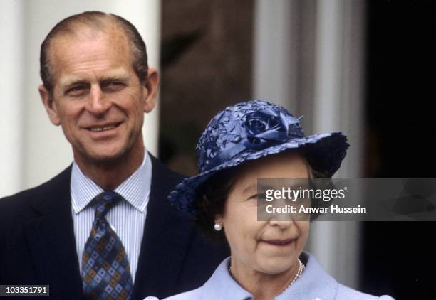 Queen Elizabeth ll and Prince Philip, Duke of Edinburgh look on during an official visit to Australia in October 1981 in Sydney, Australia.