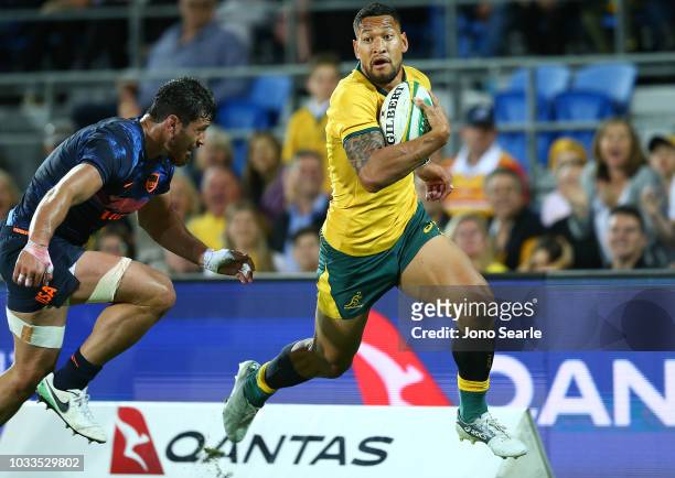 Israel Folau of the Wallabies scores a try in the corner during The Rugby Championship match between the Australian Wallabies and Argentina Pumas at...