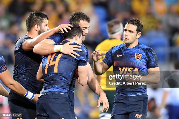 Bautista Delguy of the Pumas celebrates with team mates after scoring a goal during The Rugby Championship match between the Australian Wallabies and...