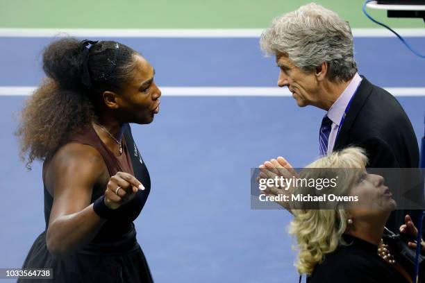 Serena Williams of the United States argues with referee Brian Earley during her Women's Singles finals match against Naomi Osaka of Japan on Day...