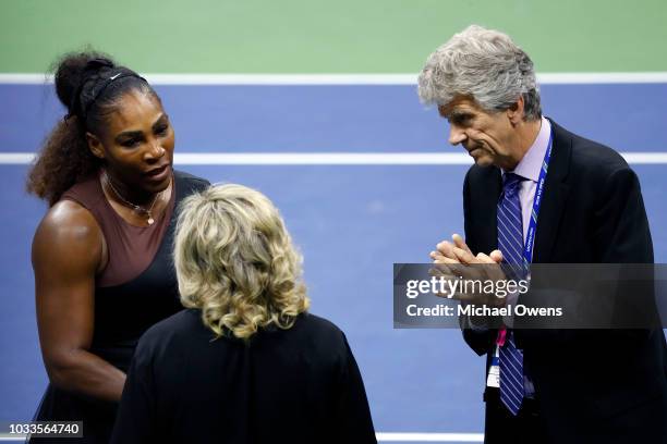 Serena Williams of the United States argues with grand slam supervisor Donna Kelso and referee Brian Earley during her Women's Singles finals match...