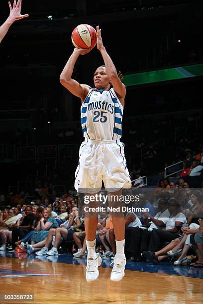 Monique Currie of the Washington Mystics makes a jump shot during the WNBA game against the Connecticut Sun at the Verizon Center on August 10, 2010...