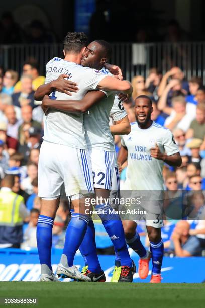 Sol Bamba of Cardiff City celebrates after scoring his team's first goal with team mate Sean Morrison of Cardiff City during the Premier League match...