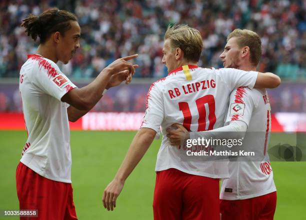 Timo Werner of Leipzig jubilates with team mates after scoring the third goal during the Bundesliga match between RB Leipzig and Hannover 96 at Red...