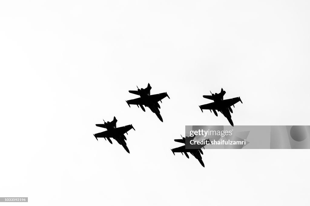 Multi jet fighters from Air Force of Malaysia fly-by during the 61st Independence Day celebration held at the administrative capital of Putrajaya.
