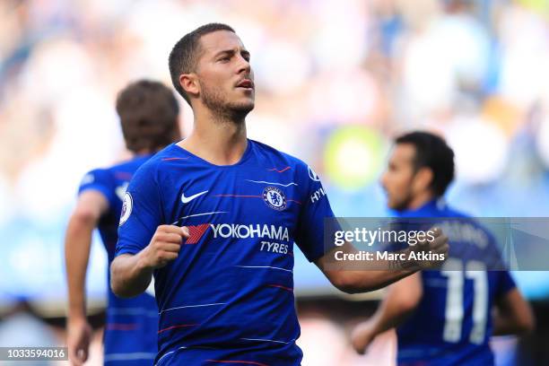 Eden Hazard of Chelsea celebrates after scoring his team's first goal during the Premier League match between Chelsea FC and Cardiff City at Stamford...